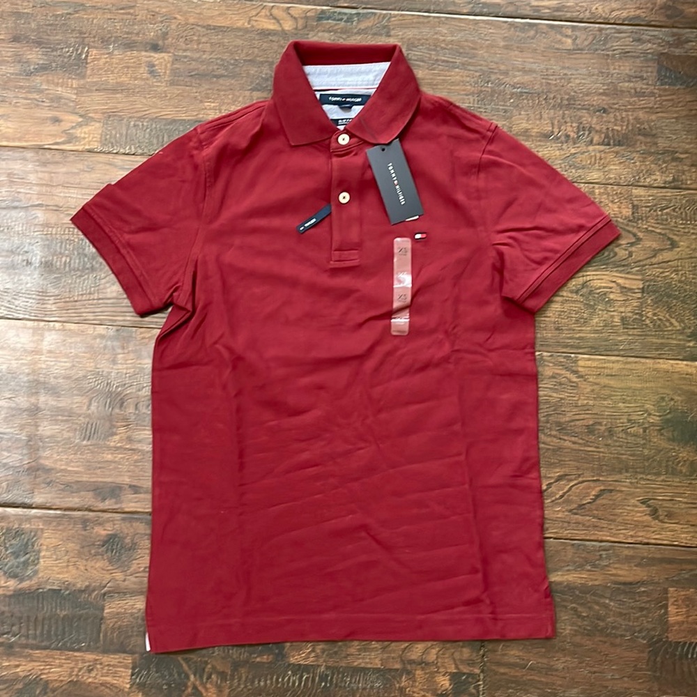Tommy Hilfiger. Brand new men’s slim fit polo. Stretching. With tag $55.
